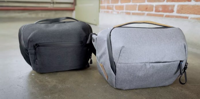 An Amazon bag is next to a Peak Design bag.