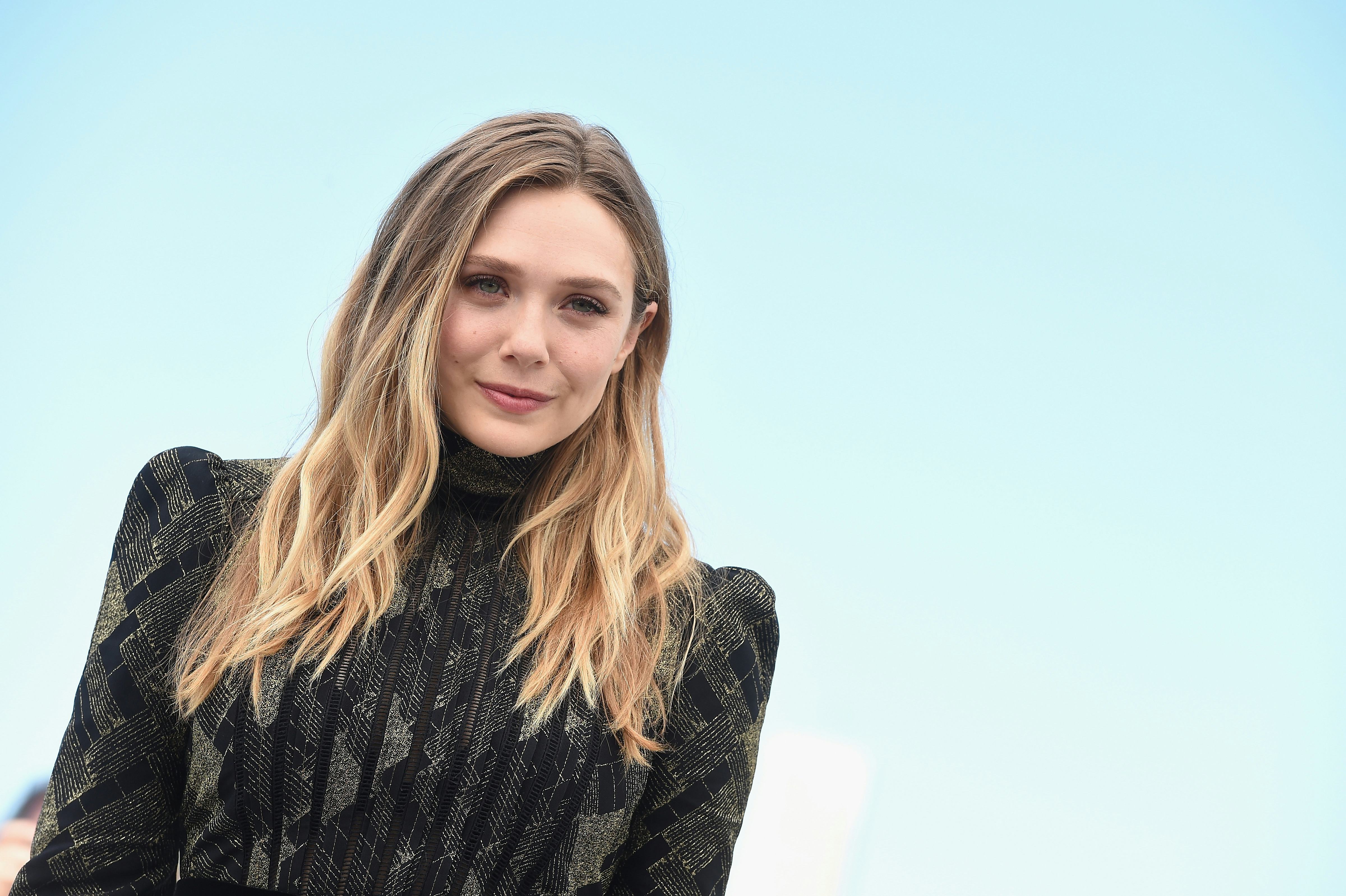 Elizabeth Olsen wearing black dress