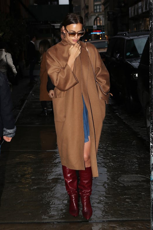 Irina Shayk is spotted leaving her hotel on Sunday. The brunette model and mother bundles up in a ca...