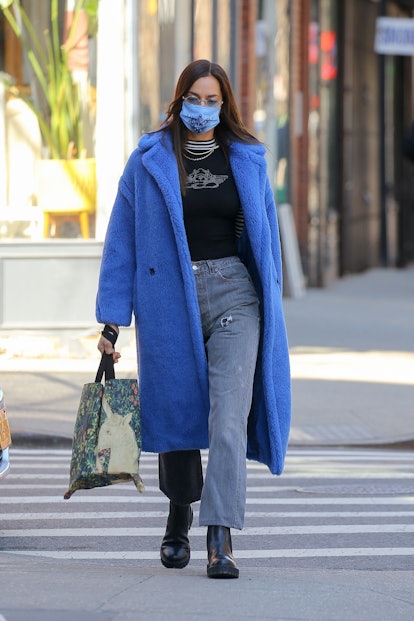 Model Irina Shayk spotted wearing a Max Mara coat in NYC while out and about running errands.