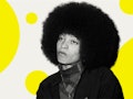 Activist Angela Davis, as a young woman, looks towards the camera with an impatient expression. Seen...