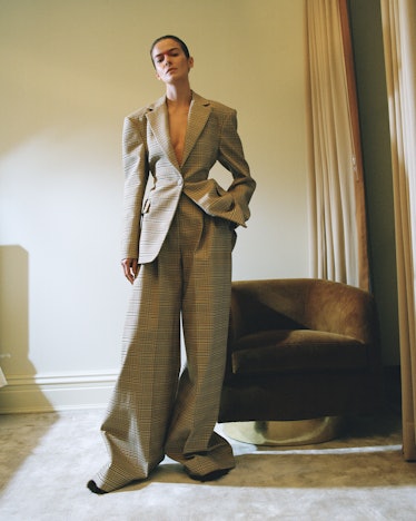 A model in an oversized suit by Altuzarra