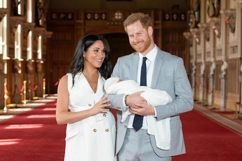 Meghan Markle & Prince Harry at the official photo-op after Archie's birth.