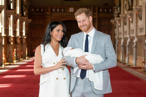 Meghan Markle & Prince Harry at the official photo-op after Archie's birth.