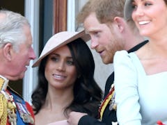 Prince Charles with Meghan Markle and Prince Harry