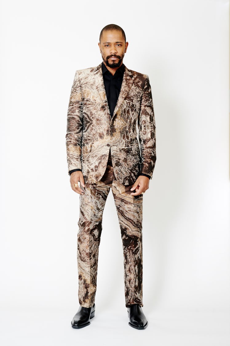 LaKeith Stanfield posing in a Louis Vuitton suit