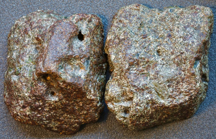 A picture of two meteorite chunks next to each other