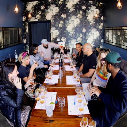 A group of people at a whiskey tasting