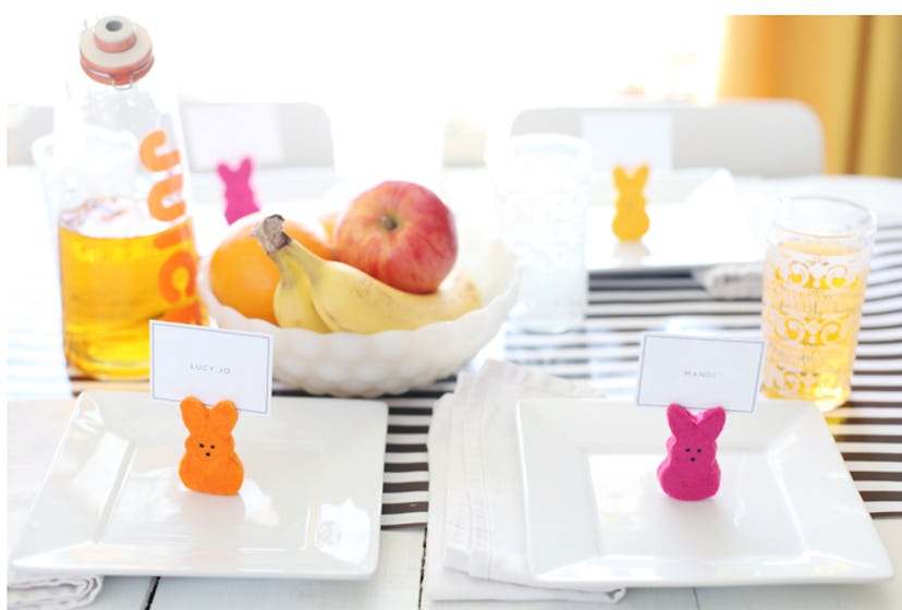 Easter table setting with pink, orange, and yellow Peep bunny place card holders