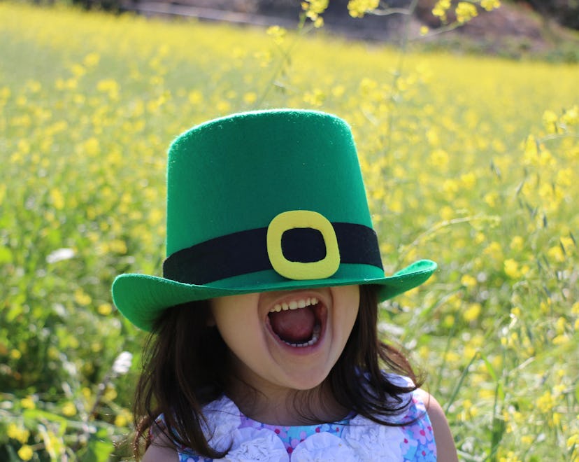 young girl in a field of flowers, how to explain St. Patrick's Day To kids