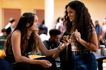 Chase Sui Wonders and Haley Sanchez in a still from Generation. The two girls are talking to each ot...