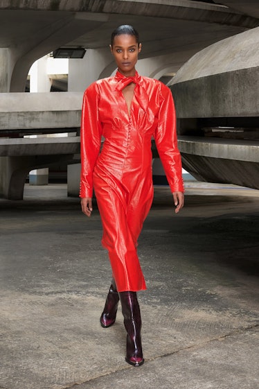 A model in a red leather jumpsuit by Isabel Marant 