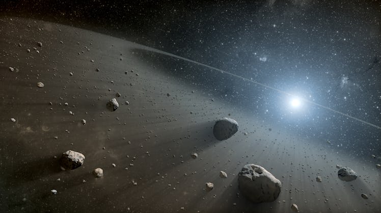 An image of asteroids circling a bright star