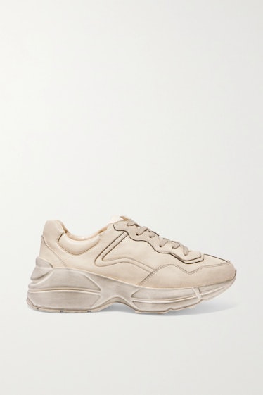 Rhyton Distressed Leather Sneakers in Cream