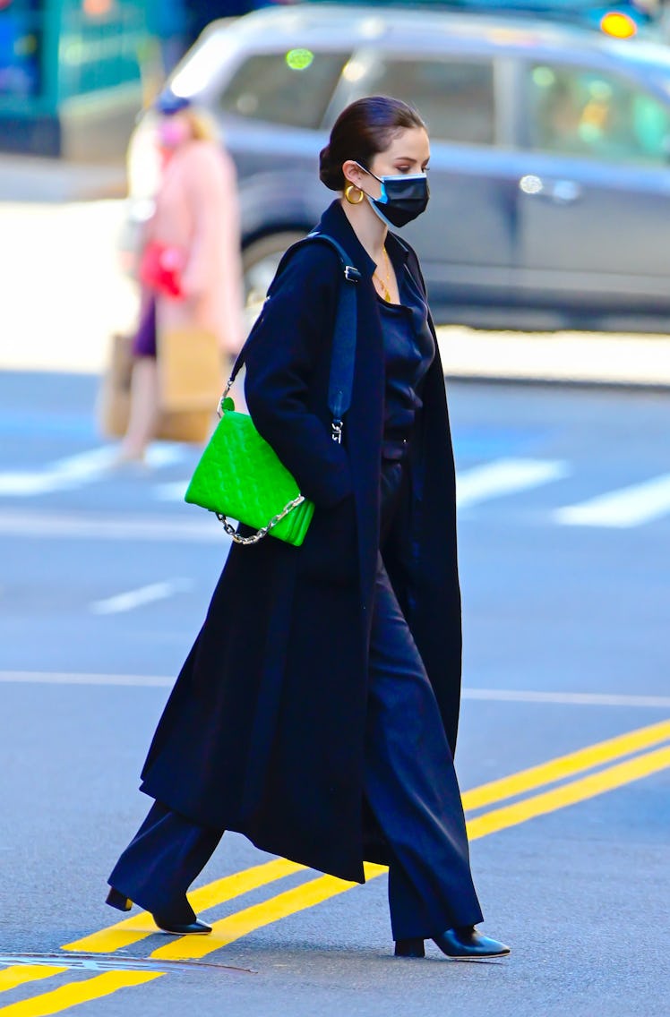 Selena Gomez crossing the street