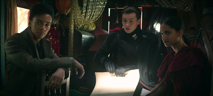 Kit Young as Jesper Fahey, Freddy Carter as Kaz Brekker, and Amita Suman as Inej Ghafa in Shadow and...