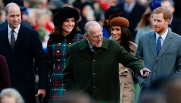 Britain's Prince Philip, Duke of Edinburgh (C) gestures as he is followed by (L-R) Britain's Prince ...