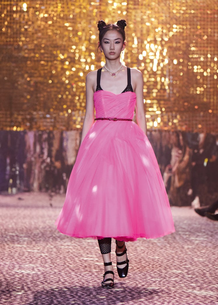 Model in a pink dress at Chrisitan Dior Pre-Fall 2021 Fashion show.