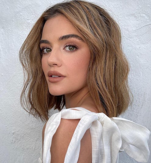 Lucy Hale's new butter blonde hair color.