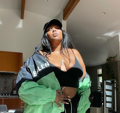 Lizzo posts an outfit photo to Instagram on March 23, 2021.