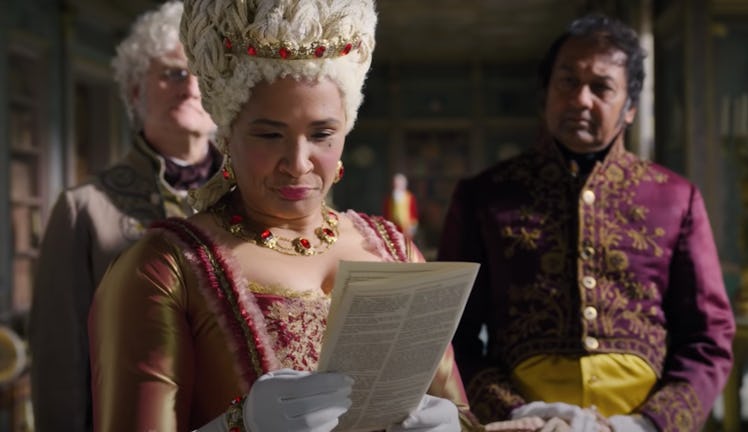 Queen Charlotte from 'Bridgerton' looks at one of Lady Whistledown's papers. 