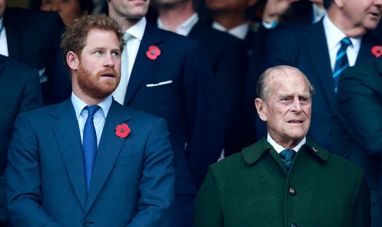 LONDON, ENGLAND - OCTOBER 31:  Prince Harry, Prince Phillip and Prince William stand for the nationa...
