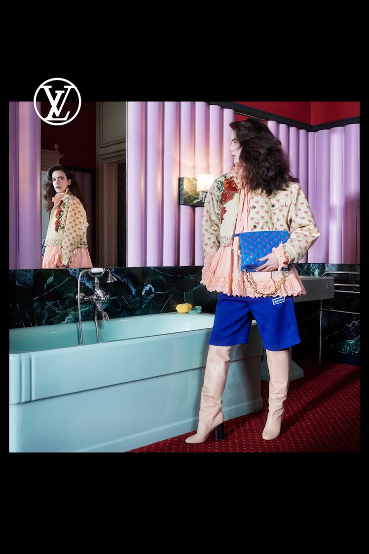 A model posing for Louis Vuitton's 2021 pre-fall campaign