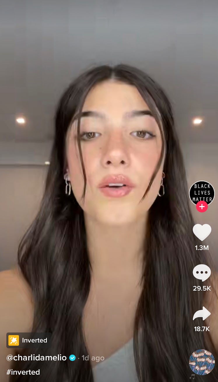 Charli D'Amelio lip syncs to "deja vu" by Olivia Rodrigo for TikTok. 