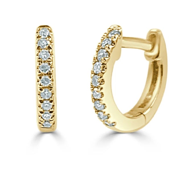 This pair of diamond earrings with a yellow gold setting are a great choice for a Mother's Day gift ...