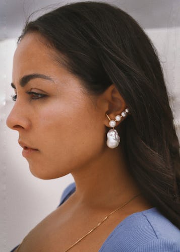 Gabriella Zacche of DYAD wears the Venus Earcuff Earring in Gold — a great birthstone jewelry piece ...