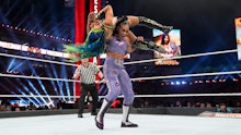 Bianca Belair lifts up Sasha Banks during a match at Wrestlemania 37 on Saturday, April 10, 2021.