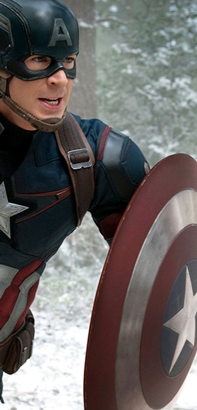 Chris Evans as Captain America holding his shield