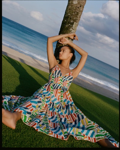 A colorful broken stripe midi dress from Solid & Striped Summer 2021 collection and campaign.