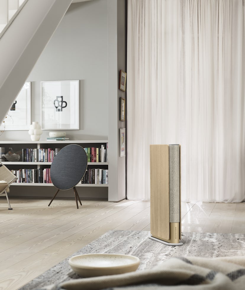 A Bang and Olufsen speaker is set in a lounge.