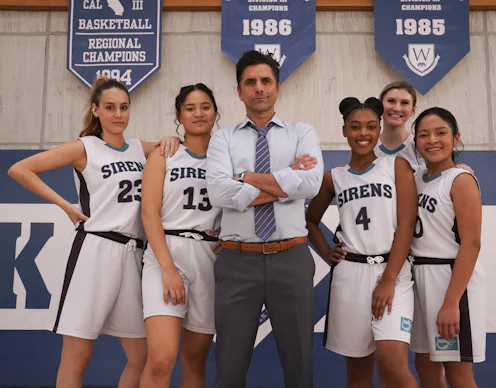 John Stamos and the cast of Big Shot via the Disney+ press site