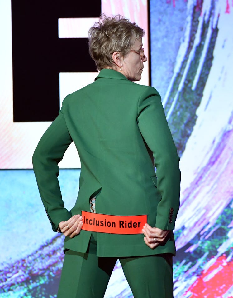 Frances McDormand holding an inclusion rider sign