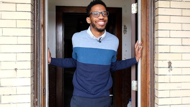 Christopher Corbett posing at a door step