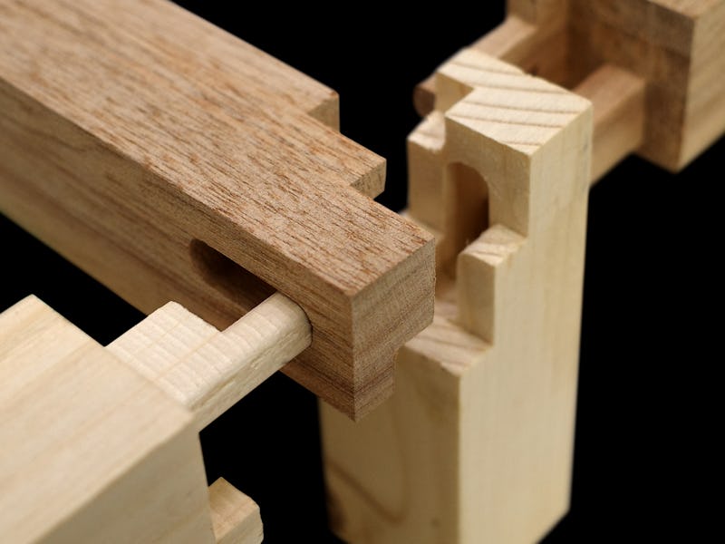 A few blocks of wood are arranged in the craft of Japanese tsugite.