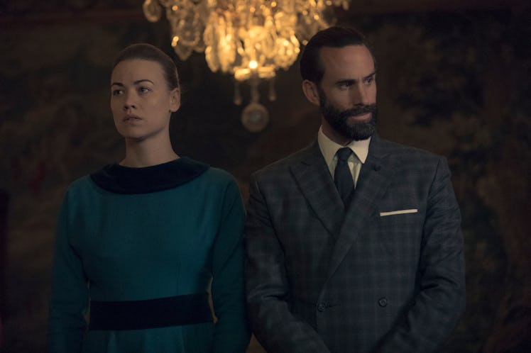 Joseph Fiennes as Commander Fred Waterford and Yvonne Strahovski as Serena Joy Waterford in The Hand...