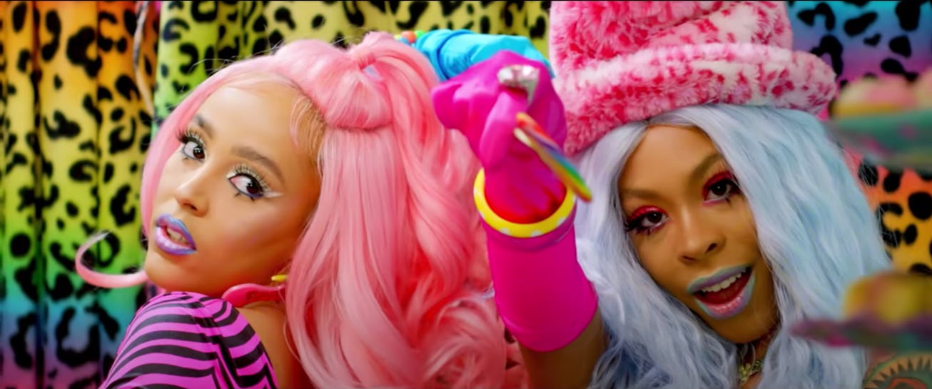 Doja Cat, in pink hair, stands next to Rico Nasty for "Tia Tamera" video