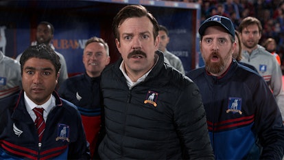 Nick Mohammed as Nate The Great, Jason Sudeikis as Ted Lasso, and Brendan Hunt as Coach Beard in Ted...