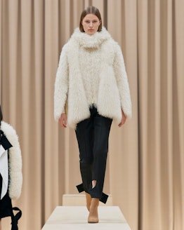 Model walks in Burberry's Fall/Winter 2021 show.