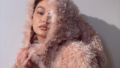 Gigi Hadid in Burberry Fall/Winter 2021 coat.