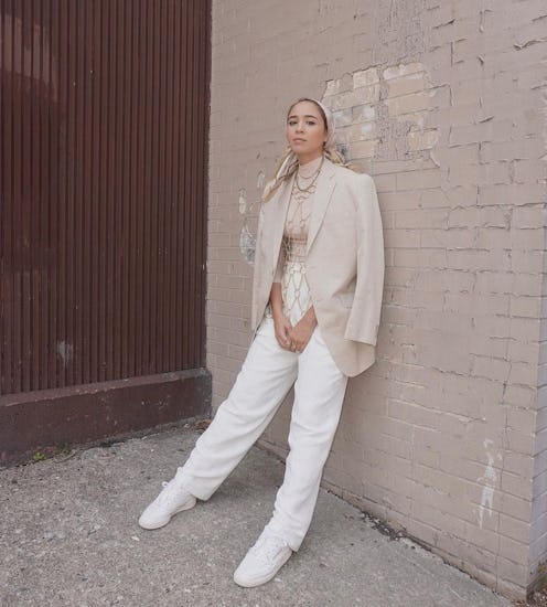 Maria Alia wearing Reebok white sneakers in a photo posted to Instagram.