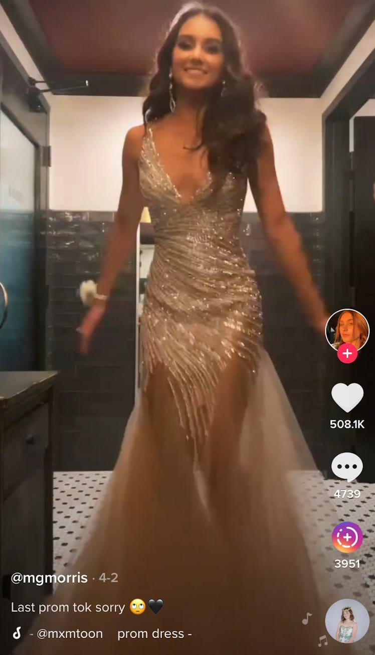 A TikToker shows off her prom dress in the bathroom. 