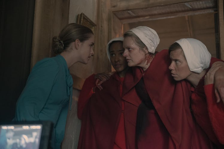 Mckenna Grace as Mrs. Keyes and Elisabeth Moss as June in The Handmaid's Tale