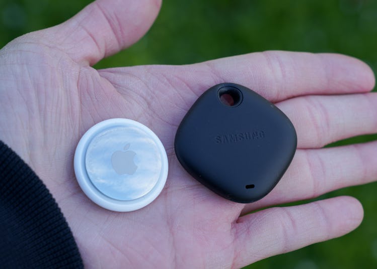 AirTag next to Samsung’s Galaxy SmartTag.