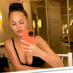 Chrissy Teigen twisted topknot hairstyle
