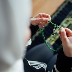 A woman praying during Ramadan.