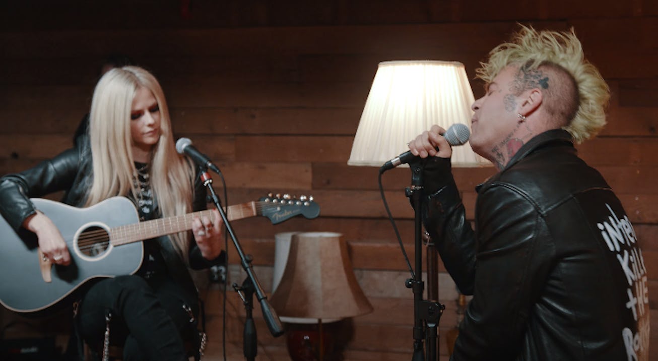 Avril Lavigne and Mod Sun shared the video for their acoustic "Flames" session.